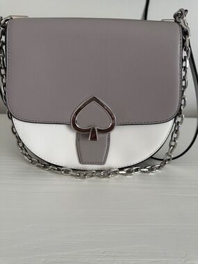 Kate Spade Two-Tone Lavender Gray & White Crossbody Bag with adjustable strap.